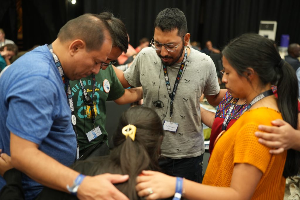 Christian conferences, conference, pray, praying together